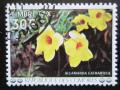 Poštová známka Komory 1977 Alamanda poèistivá, doplatná Mi# 12