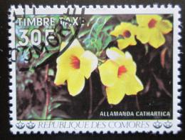 Poštová známka Komory 1977 Alamanda poèistivá, doplatná Mi# 12 - zväèši� obrázok